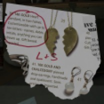 This is well hidden, but if you look across from the Reed College letter, poking around in the dark in the storage room, you can find a trunk that you can open. Do so, and there's a catalogue listing for a breakable heart necklace that Sam has noticed.